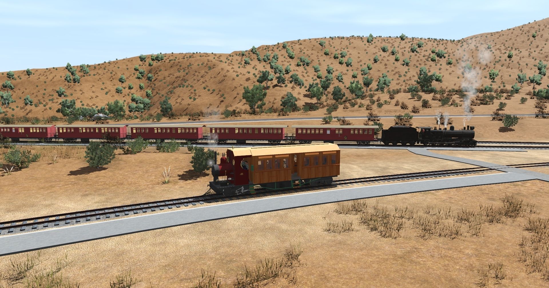 Woolshed-Flat%2C-Pichi-Richi-Railway.-SMC-%231-on-the-WYE-has-arrived-from-Quorn-while-%22The-Ghan%22-from-Port-Augusta-waits-on-the-main.jpg