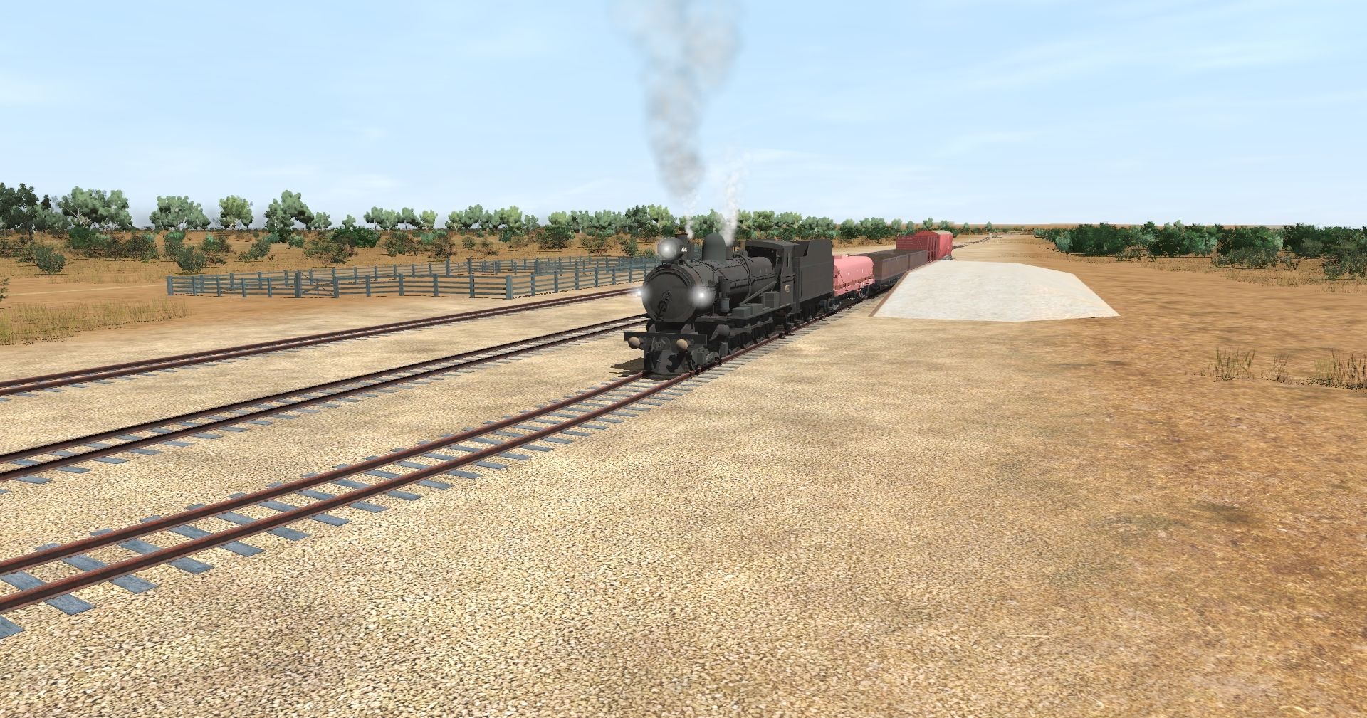 SAR-T44-with-a-short-consist-arrives-at-the-Willochra-Siding-loading-bank-with-the-weekly-Quorn---Hawker-freight-service..jpg