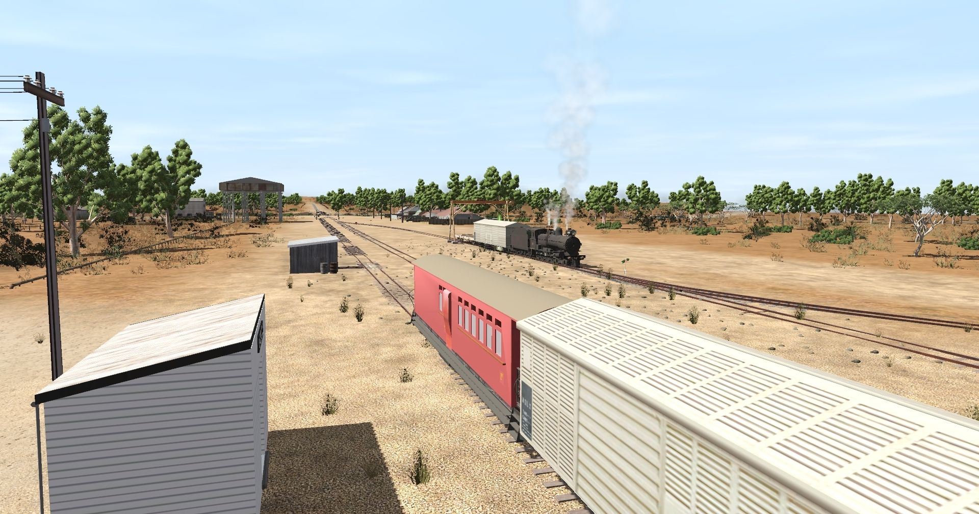 Mixed-passenger-and-freight-service-at-Nackara-on-the-Broken-Hill-Line%2C-1960s.-The-loco-is-delivering-wagons-on-the-Goods-Road..jpg