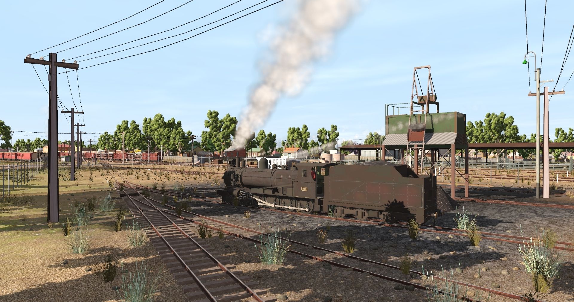 SAR-T-210-awaits-its-next-shunting-duty-at-Gladstone.-SAR-Northern-Division-%28narrow-gauge%29-1960s.jpg