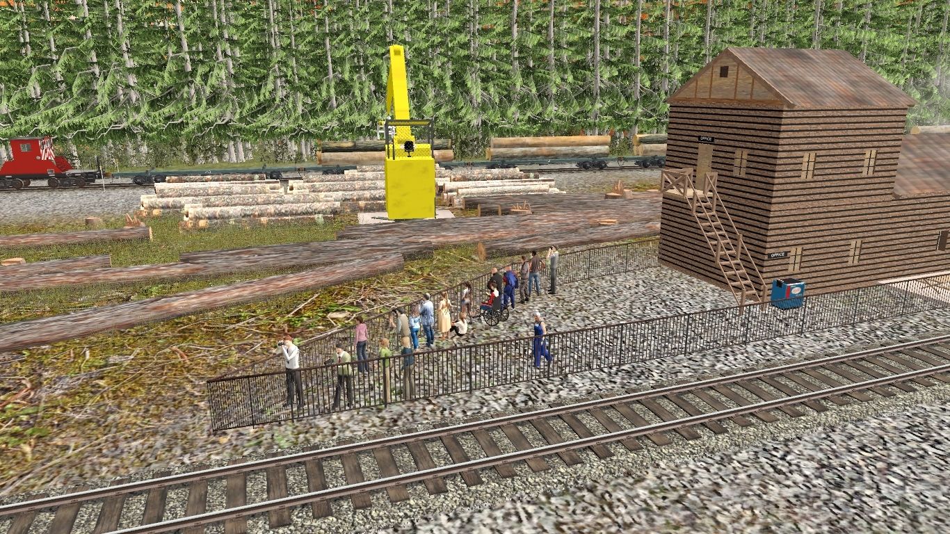 Railfan%27s-Watching-Log%27s-Being-Loaded-At-OCR.jpg