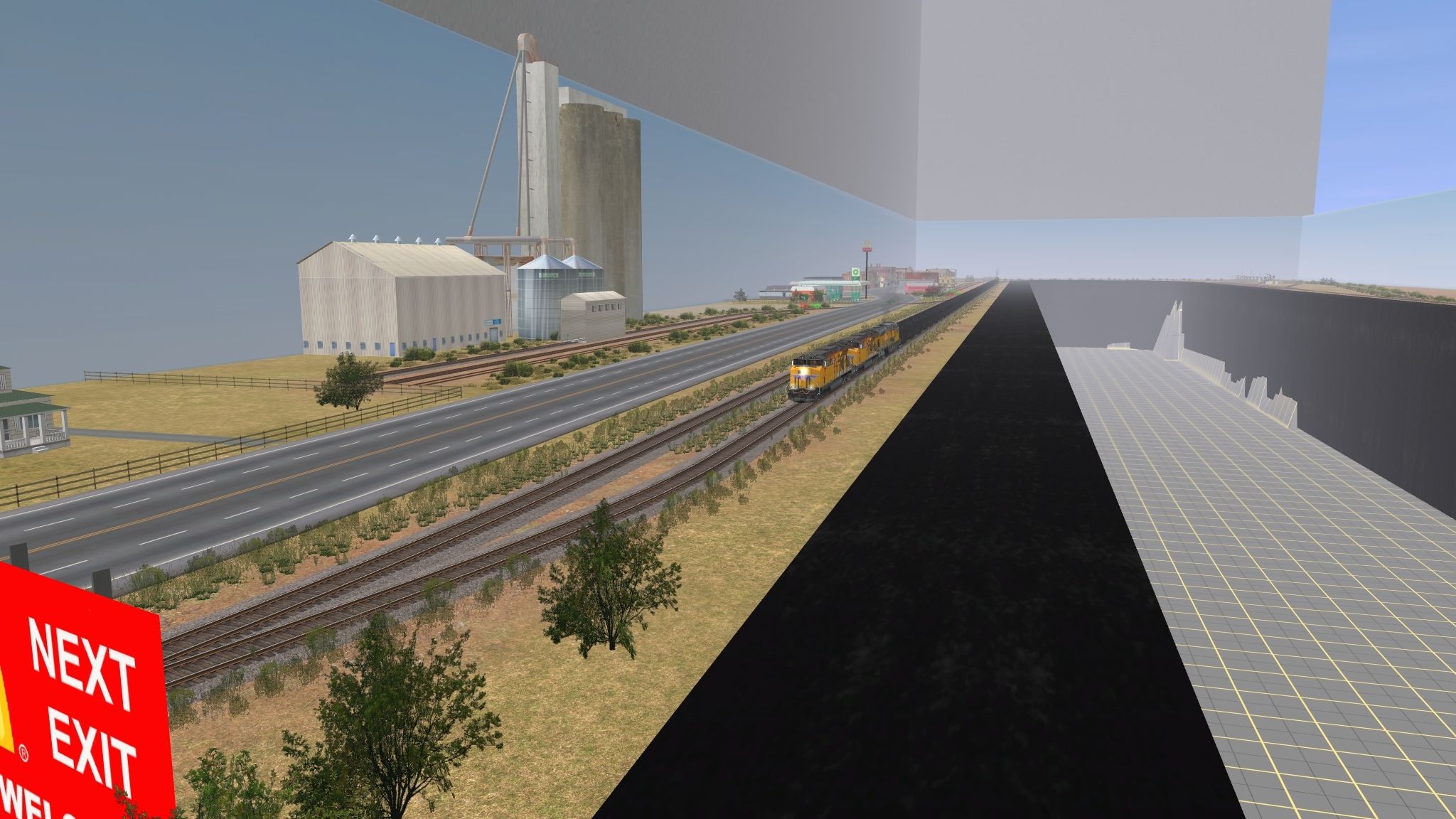A-southbound-coal-train-for-the-power-plant-at-Plains-City-passes-through--Cork..jpg