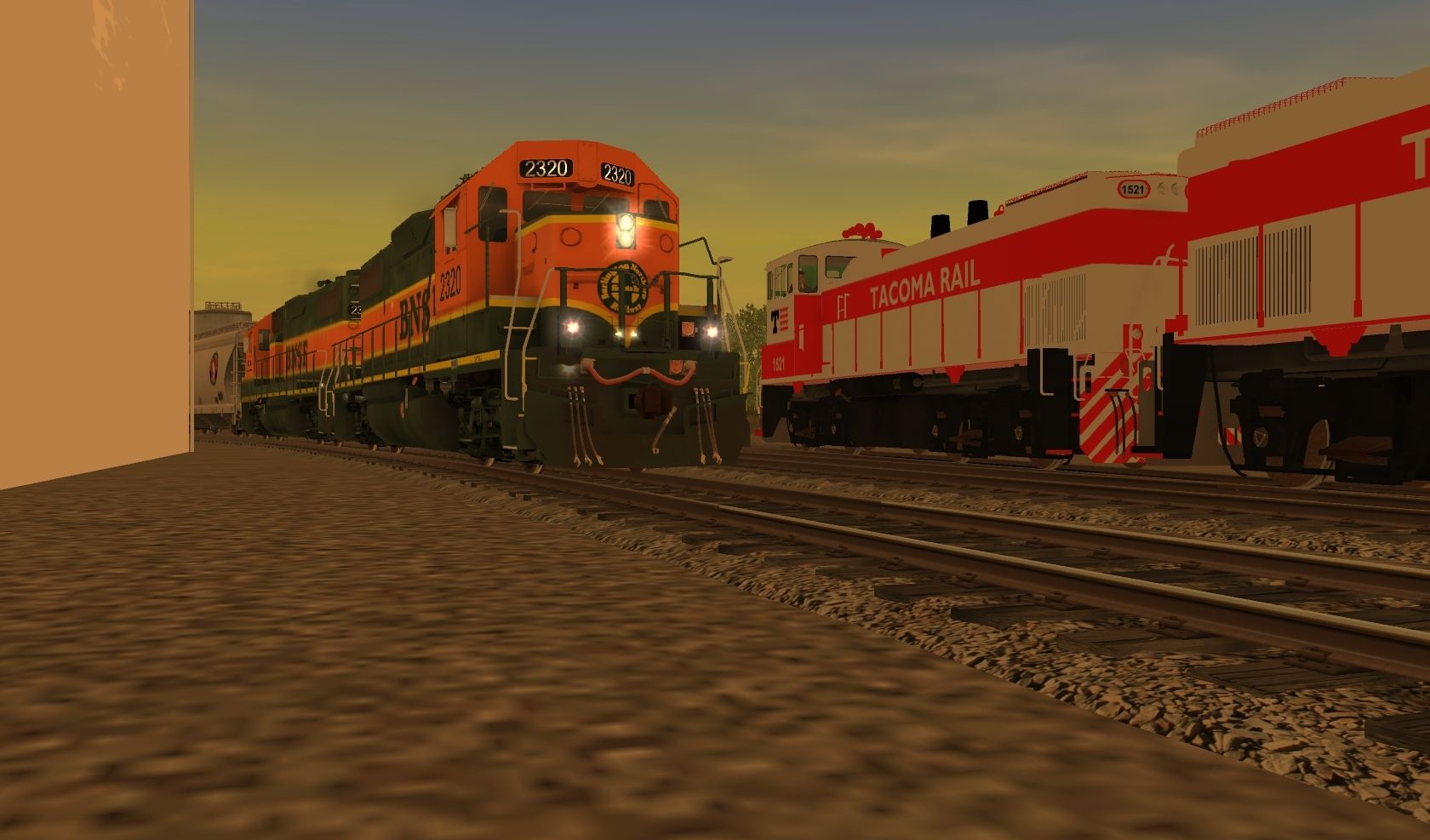 BNSF-2320-brings-an-interchange-in-through-the-Bullfrog-Wye%2C-while-TR-1521-%26-1523-take-wellcars-to-Pacific-Rail-Services-for-loading..jpg