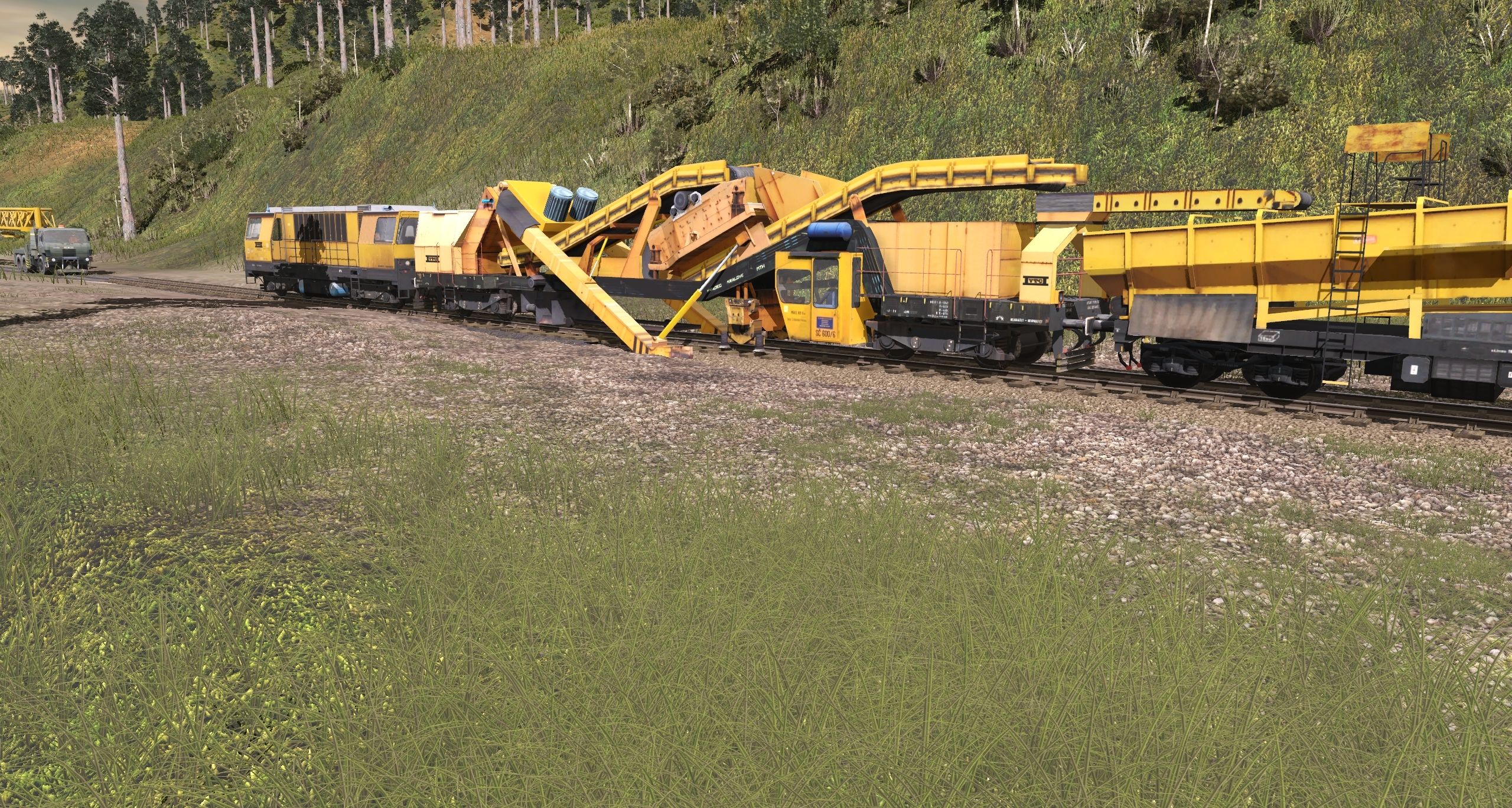 Mining-of-old-gravel-under-the-tracks.jpg