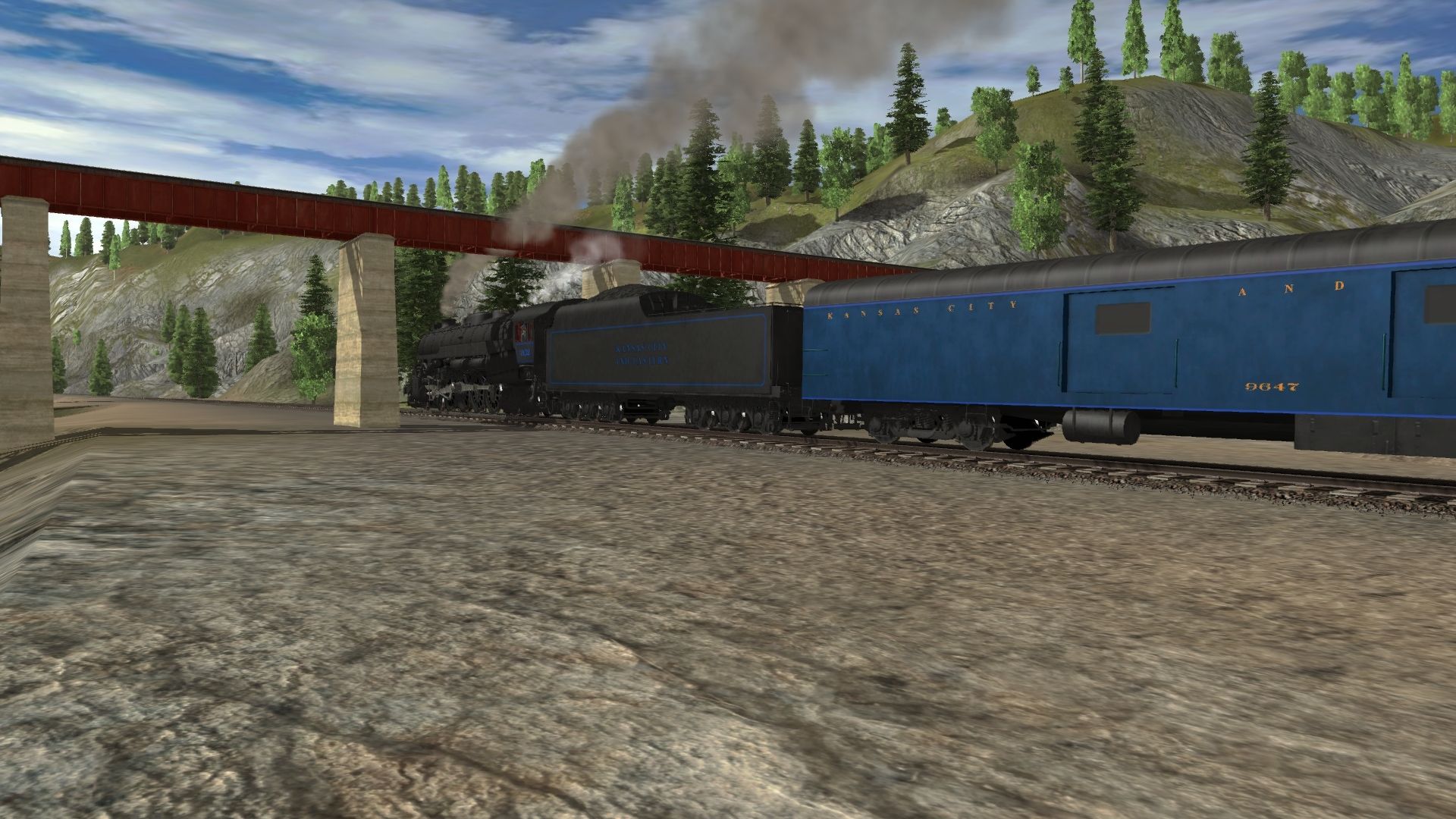 Passing-under-a-trestle%2C-the-locomotive-really-struggles-to-keep-speed-as-it-encounters-the-heavy-grade..jpg